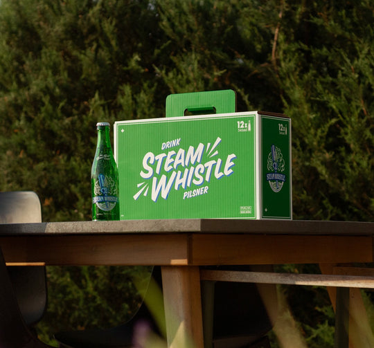 Freshness Sealed: Why We Box Our Green Bottles